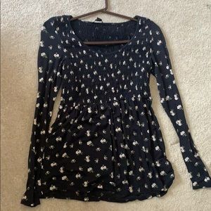Black tunic top with flower pattern